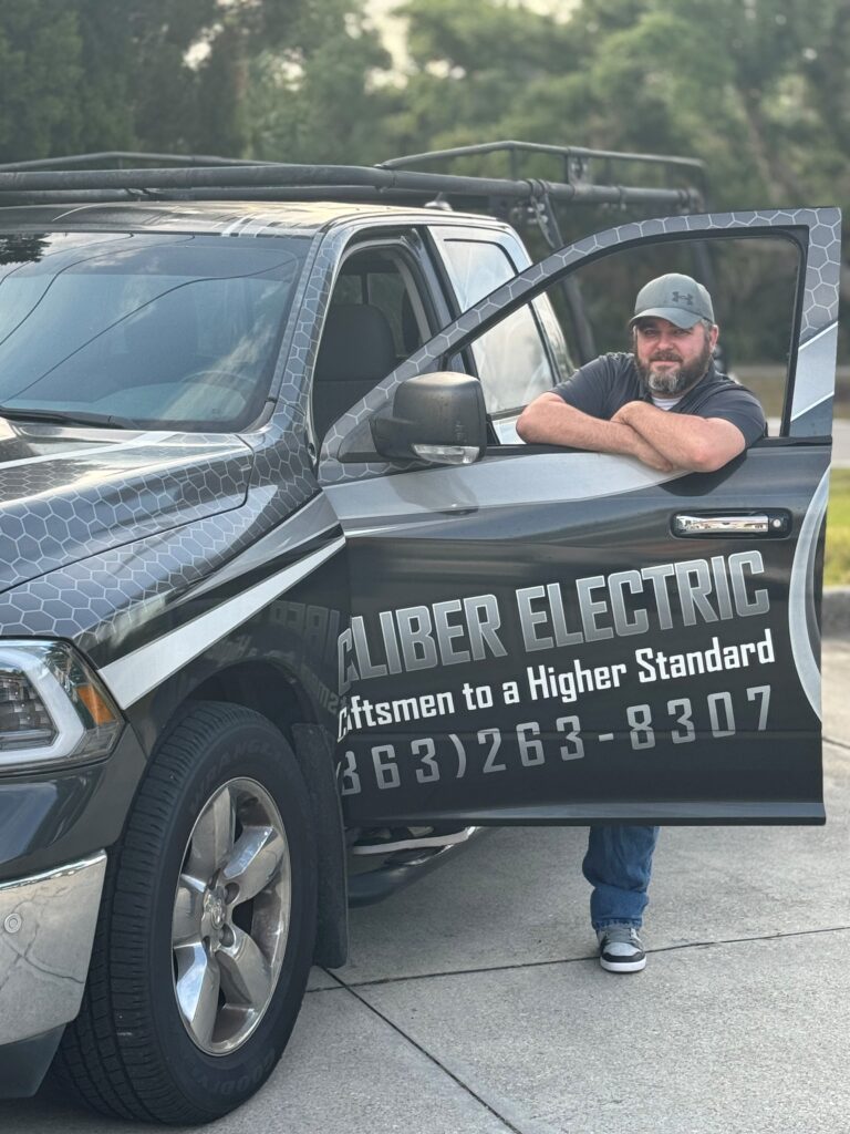 Expert electrician in Southwest Florida working on wiring.